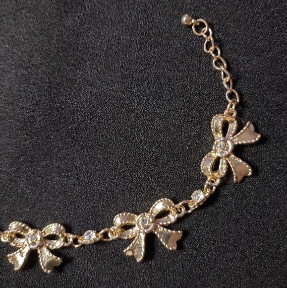 Gold And Rhinestone Bow Bracelet - Picture 7 of 9